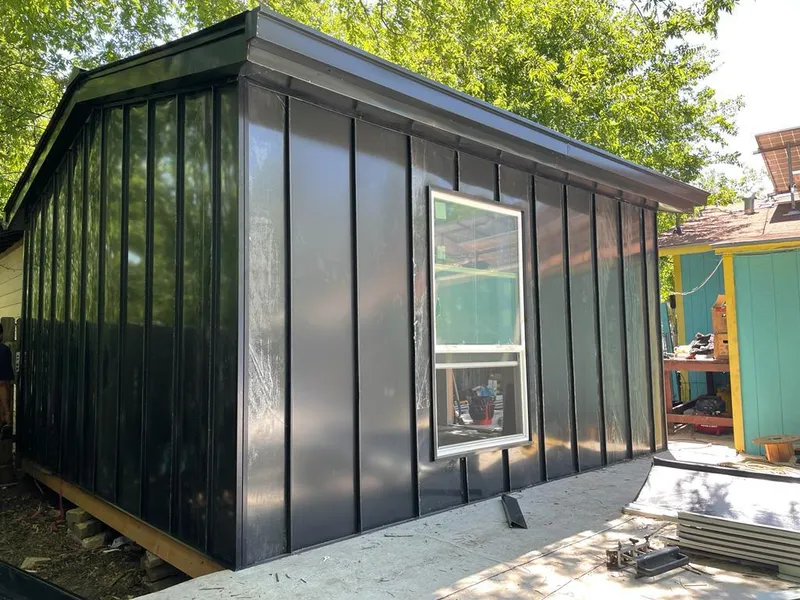 Black standing seam metal wall panels for Roof Inspection in Bradfordville